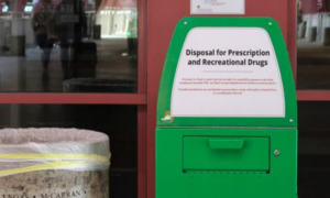 Green bin for drug disposal.